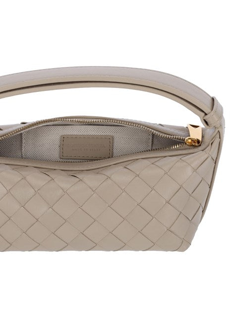 Close-up of Bottega Veneta shoulder bags hardware and fine stitching