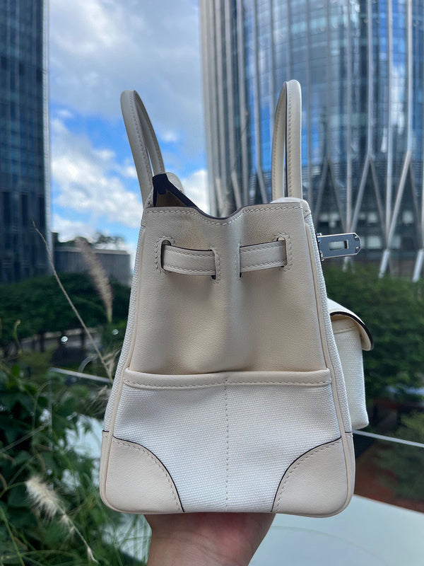 Side view of graceful structured handbag