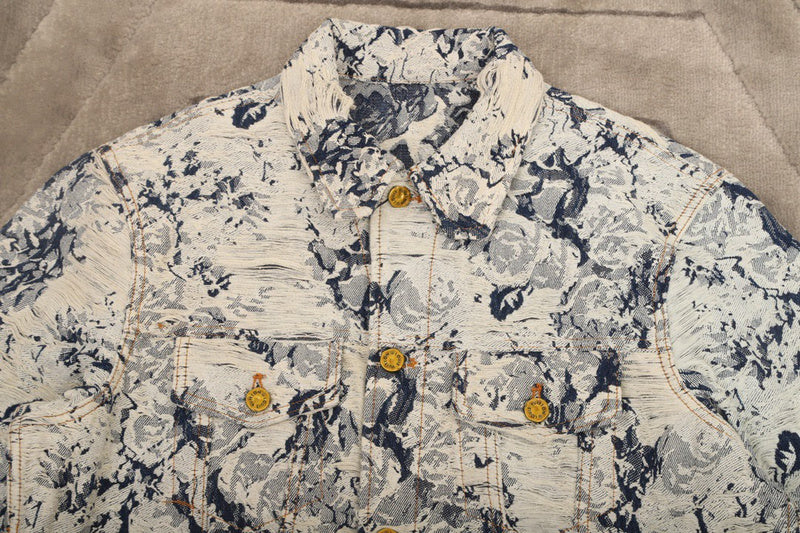 Flat lay presentation of Louis Vuitton luxury clothing with streetwear-inspired cut