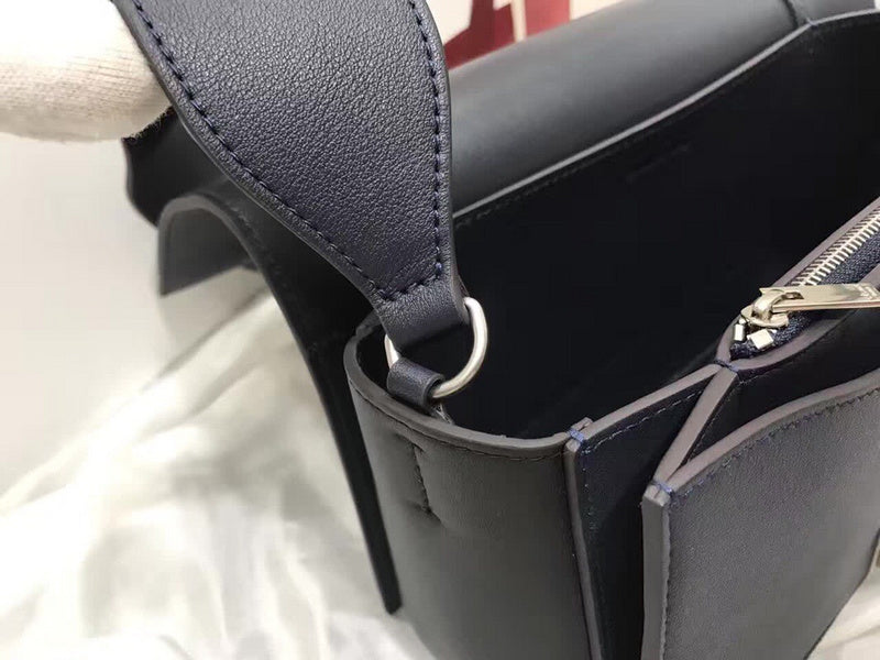 Top view of statement refined women's handbag – women's luxury accessory