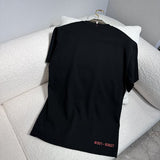 Front view of Moncler luxury clothing with monogram-inspired silhouette
