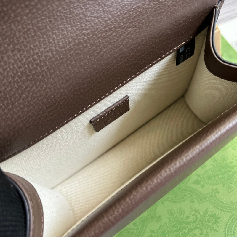 Close-up detail of polished statement women's handbag – women's luxury handbag