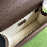 Close-up detail of polished statement women's handbag – women's luxury handbag