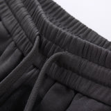 Flat lay presentation of Gucci luxury clothing with monogram-inspired silhouette