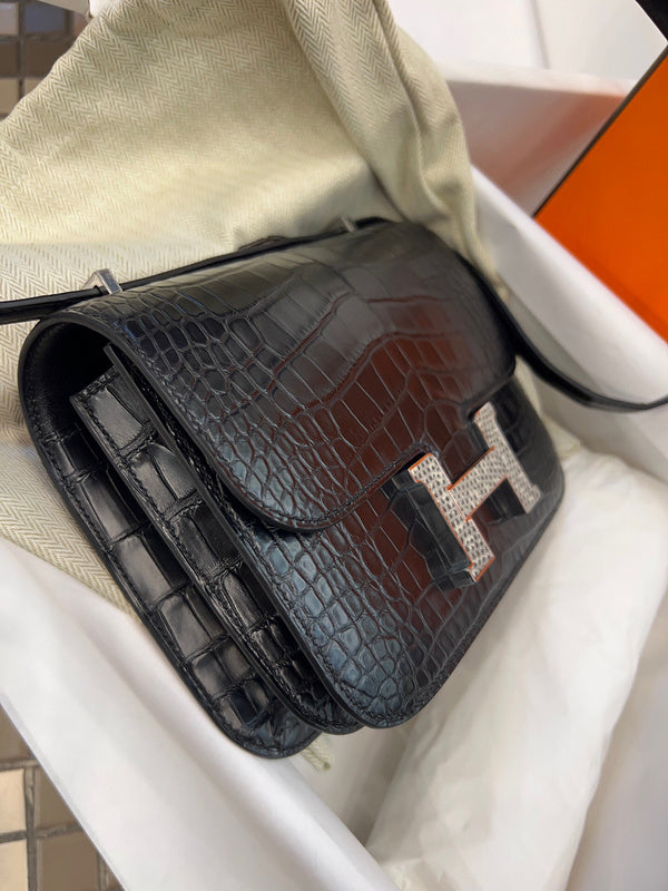 Side view of structured structured handbag