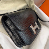 Side view of structured structured handbag