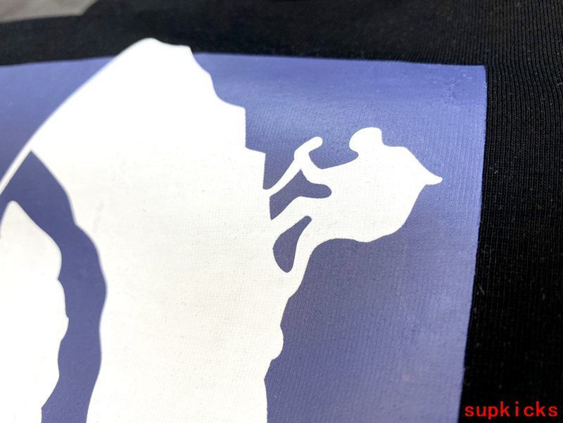 Side profile of Rhude luxury clothing with logo-detail design