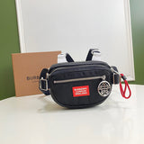 Ziva's Charm handbag – side angle view (one versatile size)