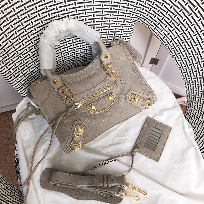 Front view of polished classic women's handbag – women's luxury accessory