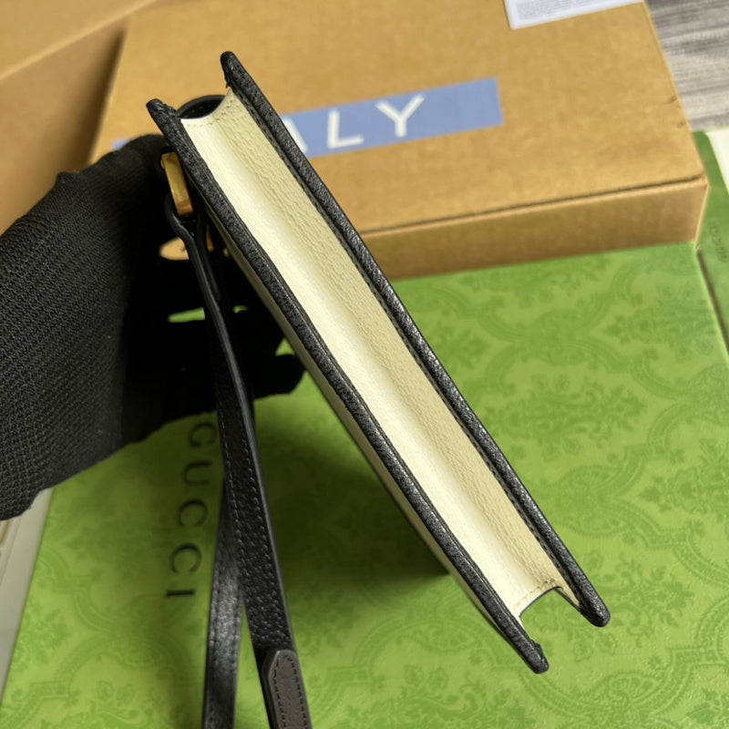 Back view of signature classic women's handbag – women's luxury handbag