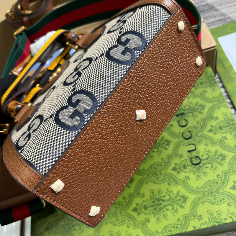 Styled lifestyle shot of refined modern women's handbag – women's luxury handbag