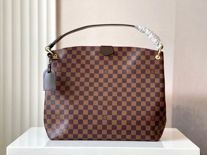 Side profile of sleek everyday-luxe women's handbag – women's designer-style accessory