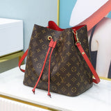 Side profile of elevated classic women's handbag – women's statement bag
