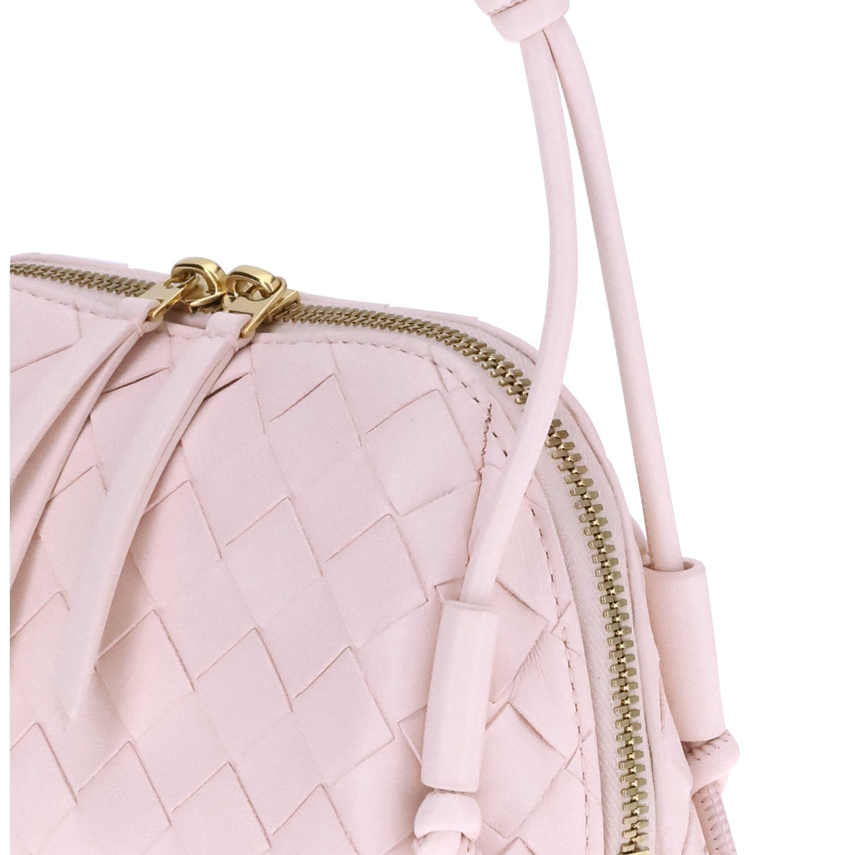 Close-up of Bottega Veneta clutches hardware and fine stitching