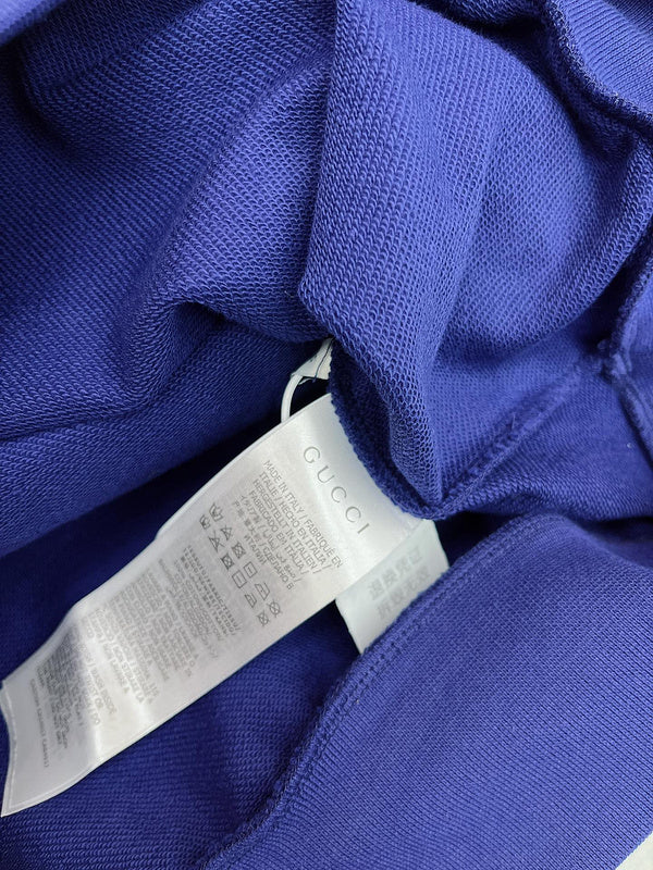 Front view of Gucci luxury clothing with logo-detail design