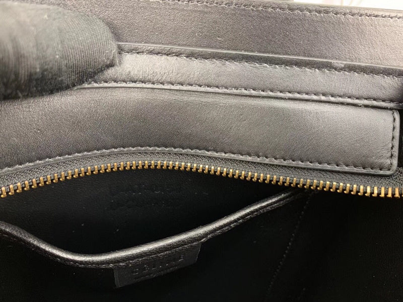 Front view of refined polished women's handbag – women's statement bag