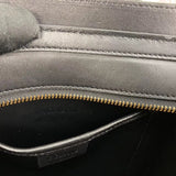 Front view of refined polished women's handbag – women's statement bag