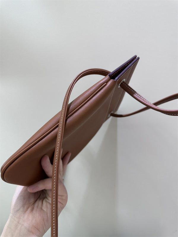 Side view of classic structured handbag