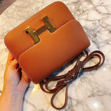  minimalist top-handle bag styled with outfit 18