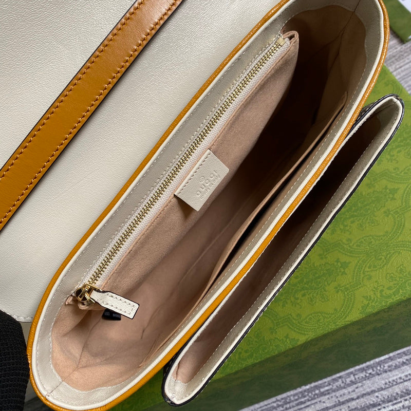 Side profile of signature polished women's handbag – women's premium purse