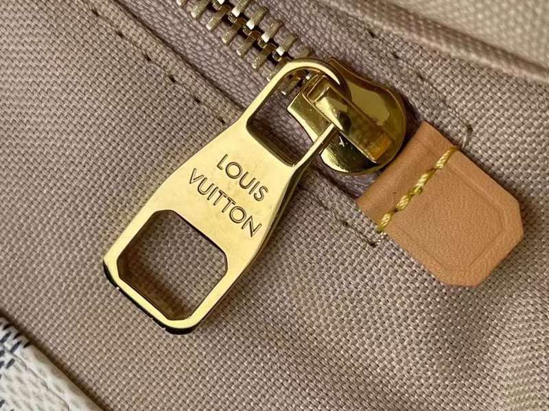 Handle and strap detail of polished elevated women's handbag – women's luxury handbag