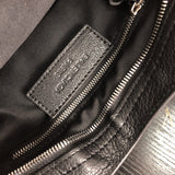 Close-up detail of elevated modern women's handbag – women's statement bag