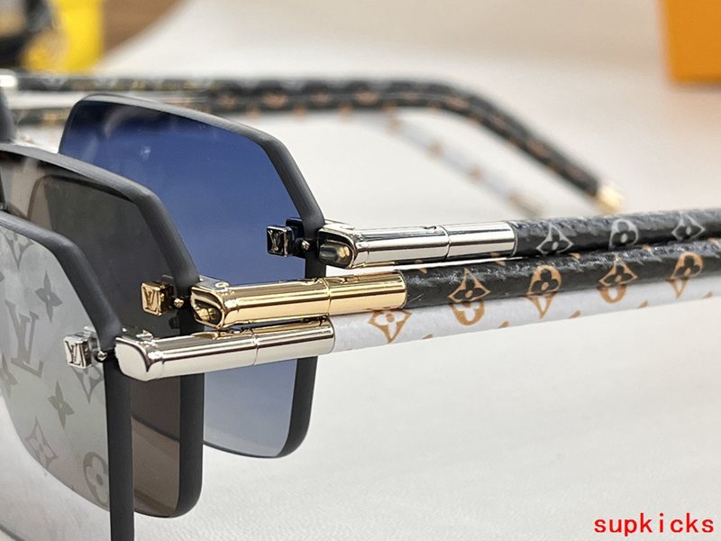 Close-up detail view of Louis Vuitton unisex sunglasses