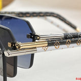 Close-up detail view of Louis Vuitton unisex sunglasses