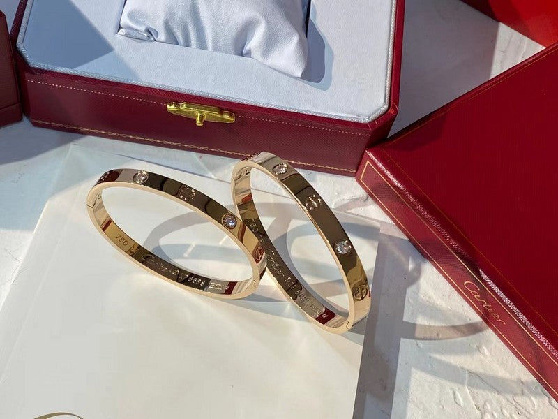 Side view of Cartier unisex jewelry piece