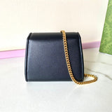 Side profile of chic structured women's handbag – women's luxury accessory