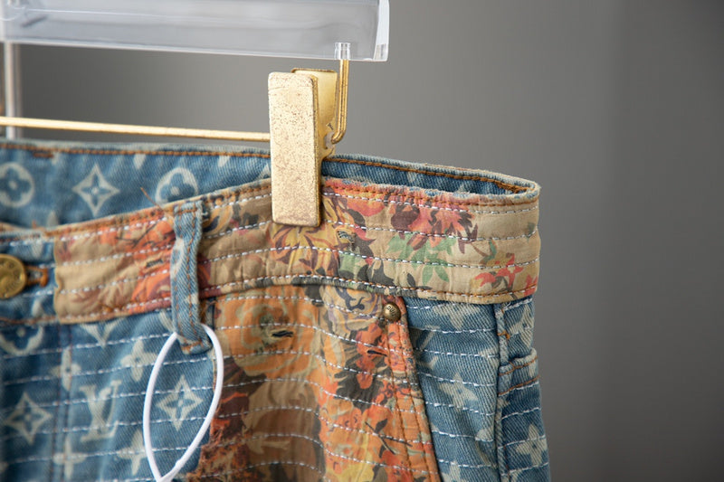 Full styled look of Louis Vuitton luxury clothing with logo-detail design
