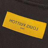 Side profile of Louis Vuitton luxury clothing with tailored silhouette