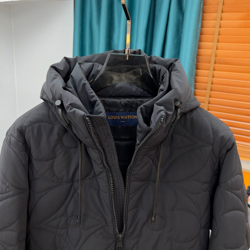 Flat lay presentation of Louis Vuitton luxury clothing with runway-inspired design