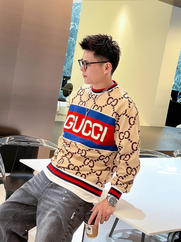 Flat lay presentation of Gucci luxury clothing with logo-detail design