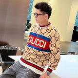 Flat lay presentation of Gucci luxury clothing with logo-detail design