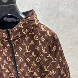 Back view of Louis Vuitton luxury clothing with label-forward styling