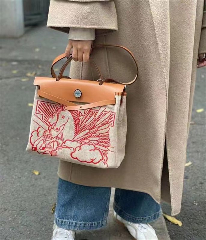 Side view of sophisticated structured handbag