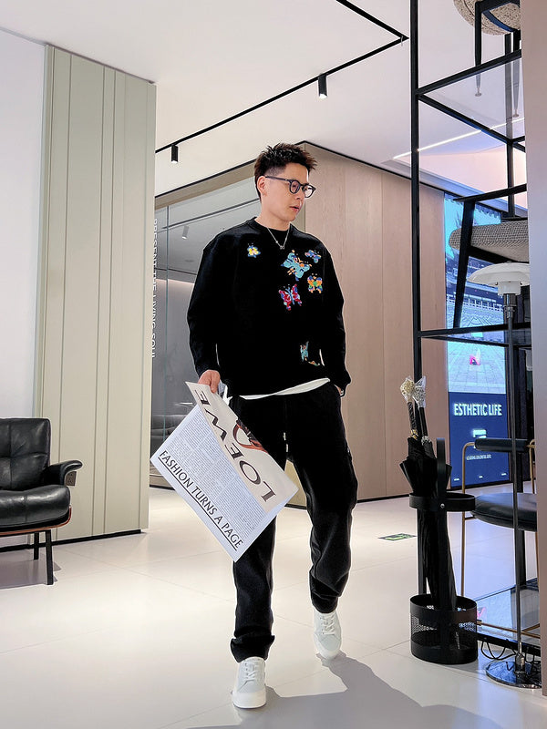 Flat lay presentation of Louis Vuitton luxury clothing with contemporary cut