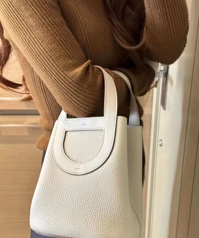 Side view of classic structured handbag