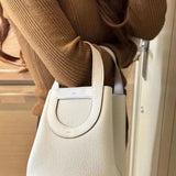 Side view of classic structured handbag