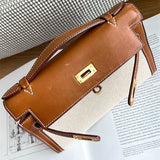  Elegant handbag carried on shoulder