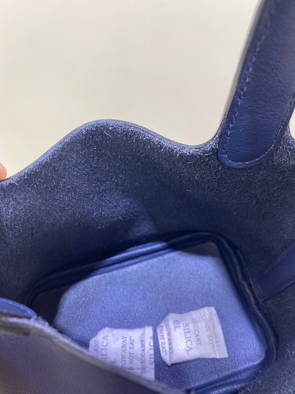 Close-up detail of understated bag design