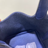 Close-up detail of understated bag design