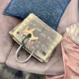 Understated bag shown from front angle