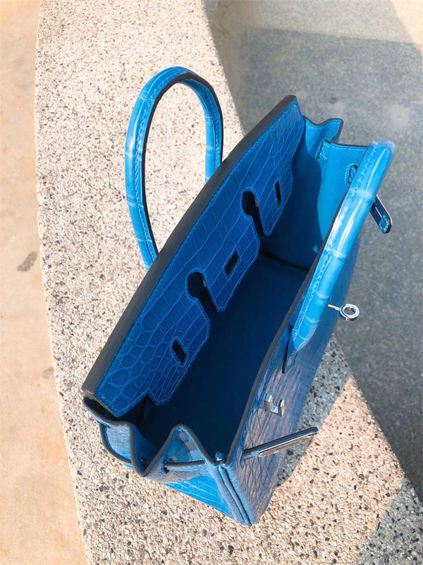  Timeless top-handle bag carried on shoulder 10