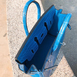  Timeless top-handle bag carried on shoulder 10