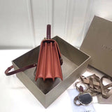 Statement Faux Leather Handbag - Polished Finish | Women's Fashion Handbag #1762 - styled full view (image 7) of designer-inspired handbag