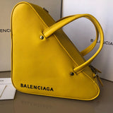 Sophisticated Vegan Leather Handbag - Smooth Faux-Leather Exterior | Women's Fashion Handbag #900 - side angle view (image 2) of designer-inspired handbag
