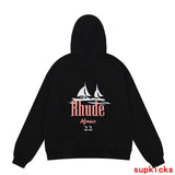 Flat lay presentation of Rhude luxury clothing with streetwear-inspired cut