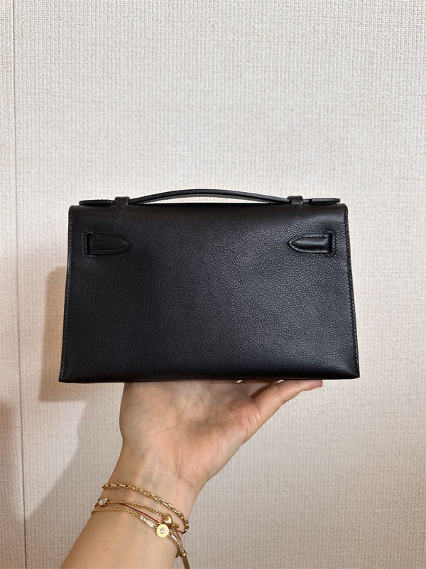  smart top-handle bag styled with outfit